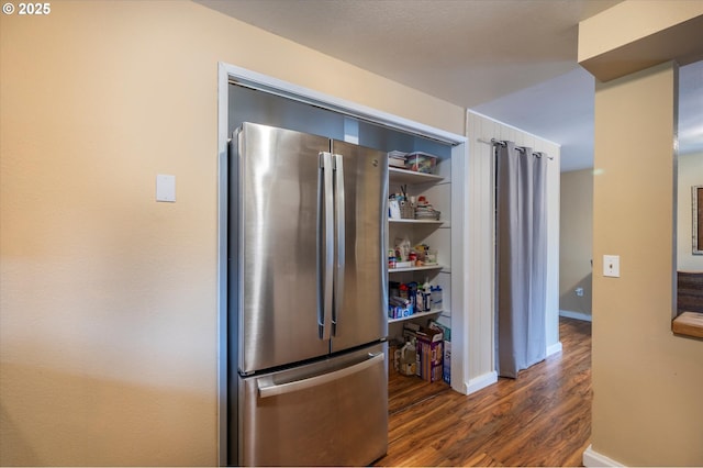 1145 Newport Ave SW, Bandon, OR 97411 - kitchen featuring freestanding refrigerator, dark wood-style flooring, and open shelves