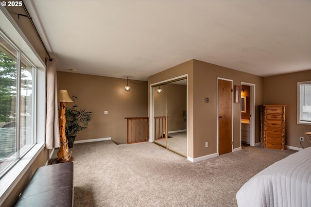 1145 Newport Ave SW, Bandon, OR 97411 - unfurnished bedroom featuring carpet flooring and baseboards