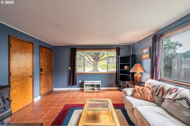 1145 Newport Ave SW, Bandon, OR 97411 - living room featuring tile patterned flooring and ornamental molding