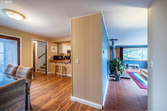 1145 Newport Ave SW, Bandon, OR 97411 - hallway with wood finished floors and stairs