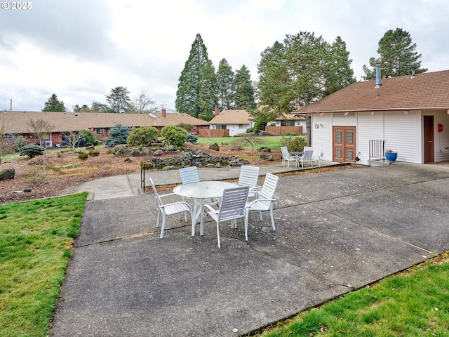 view of patio featuring french doors and outdoor dining area