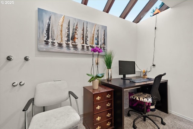 office with vaulted ceiling, baseboards, and carpet floors