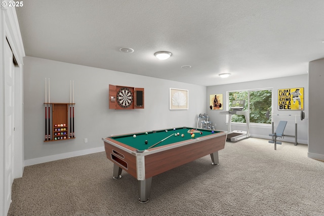 rec room featuring carpet, a textured ceiling, and billiards