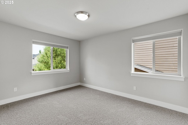 unfurnished room with carpet