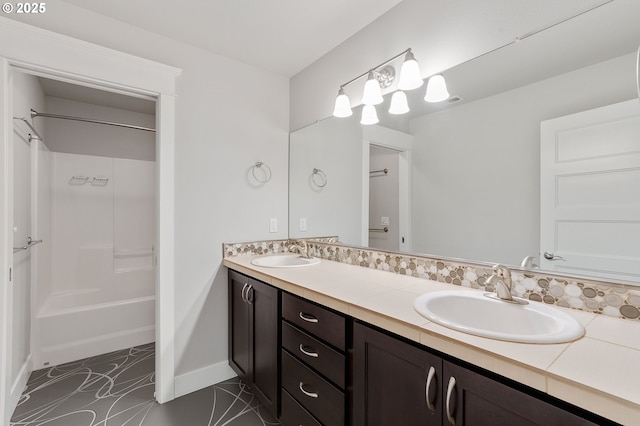 28340 SW Mcgraw Ave, Wilsonville, OR 97070 - full bath with double vanity, baseboards, and bathing tub / shower combination