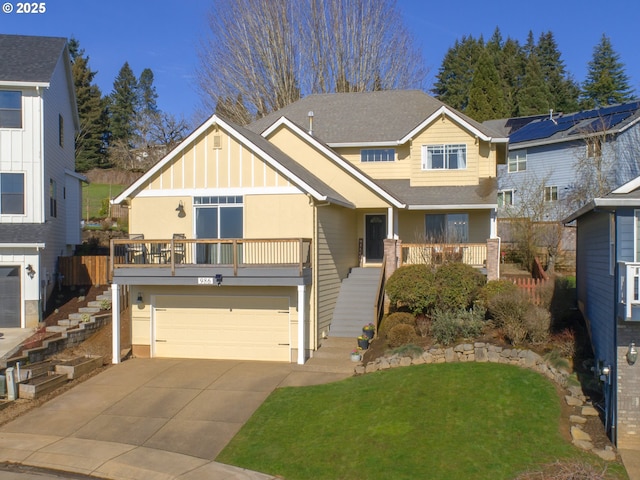 view of front facade featuring stairway, board and batten siding, a front yard, a garage, and driveway