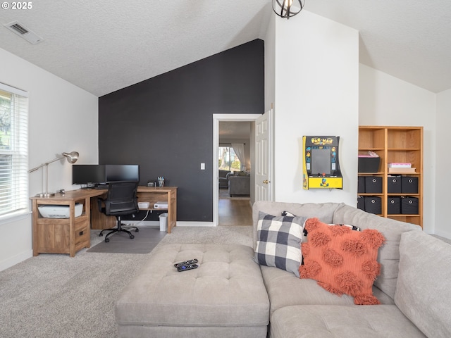 carpeted office space featuring visible vents, a textured ceiling, and baseboards