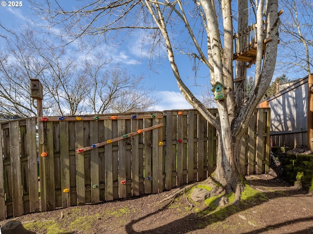 view of yard featuring fence