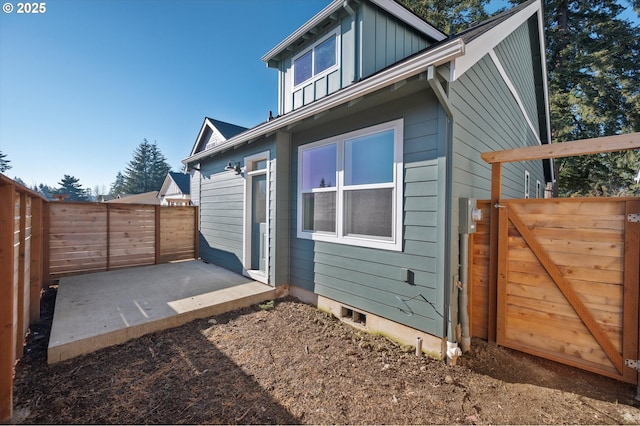 view of home's exterior with a patio area