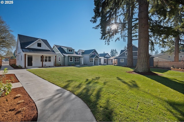 view of front of home featuring a front lawn