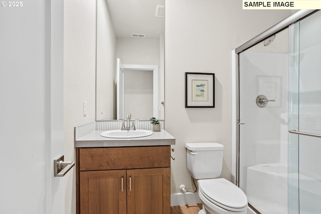 8276 SE Orion Ln, Hillsboro, OR 97123 - full bath featuring a shower stall, toilet, and vanity