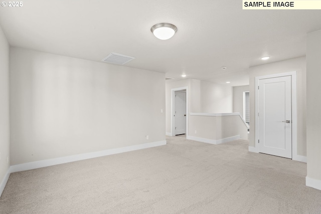 8276 SE Orion Ln, Hillsboro, OR 97123 - spare room with light carpet, recessed lighting, and baseboards