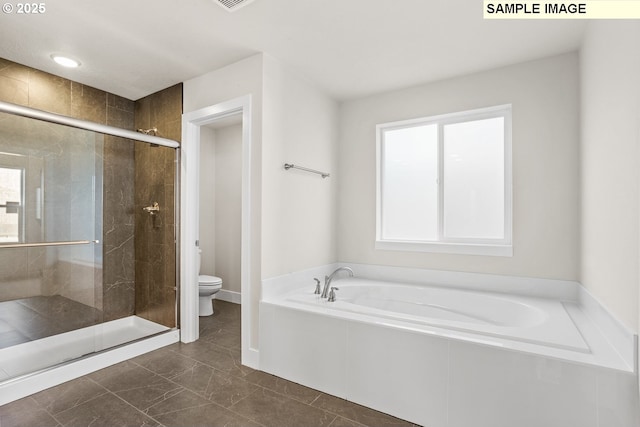 8276 SE Orion Ln, Hillsboro, OR 97123 - full bathroom featuring toilet, a bath, a stall shower, and baseboards