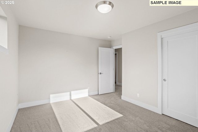 8276 SE Orion Ln, Hillsboro, OR 97123 - unfurnished bedroom with carpet floors and baseboards