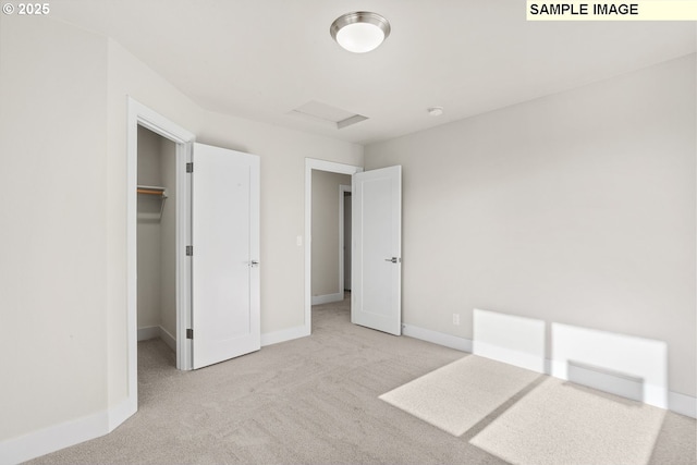 8276 SE Orion Ln, Hillsboro, OR 97123 - unfurnished bedroom with carpet, attic access, a spacious closet, and baseboards