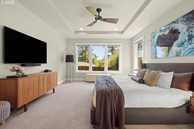 4480 Upper Dr, Lake Oswego, OR 97035 - bedroom with light colored carpet, recessed lighting, a tray ceiling, baseboards, and a ceiling fan