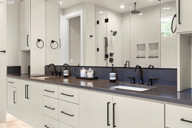 4480 Upper Dr, Lake Oswego, OR 97035 - bathroom featuring a stall shower, double vanity, and recessed lighting