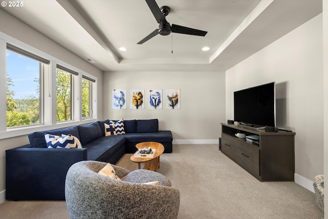 4480 Upper Dr, Lake Oswego, OR 97035 - living area featuring light colored carpet, baseboards, a tray ceiling, a ceiling fan, and recessed lighting