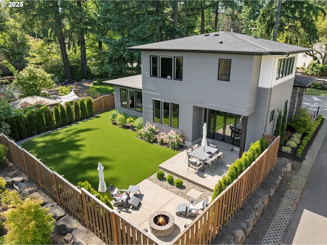 4480 Upper Dr, Lake Oswego, OR 97035 - back of house featuring a patio area, a fire pit, a fenced backyard, and a shingled roof