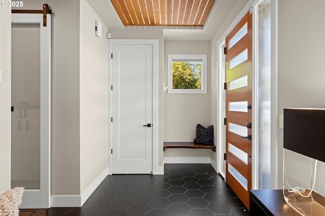 4480 Upper Dr, Lake Oswego, OR 97035 - foyer entrance with baseboards and dark tile patterned floors