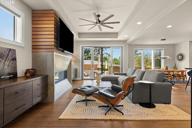 4480 Upper Dr, Lake Oswego, OR 97035 - living area with a glass covered fireplace, plenty of natural light, ceiling fan, dark wood-style flooring, and recessed lighting