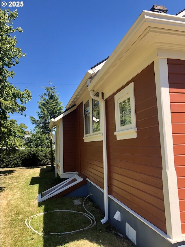 3929 SE 65th Ave, Portland, OR 97206 - view of side of property with a lawn and crawl space