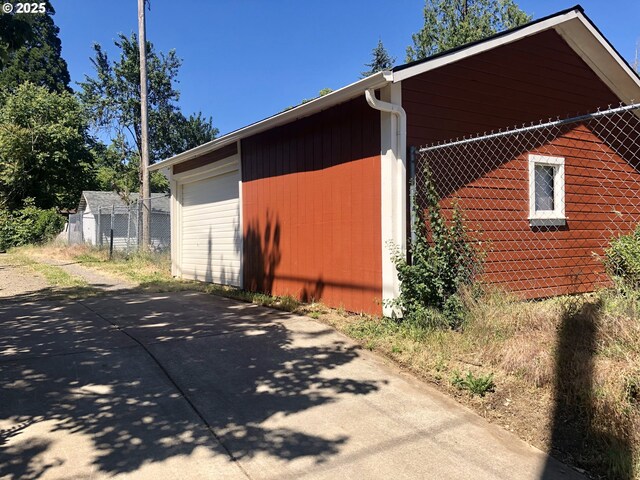 3929 SE 65th Ave, Portland, OR 97206 - view of property exterior featuring a detached garage