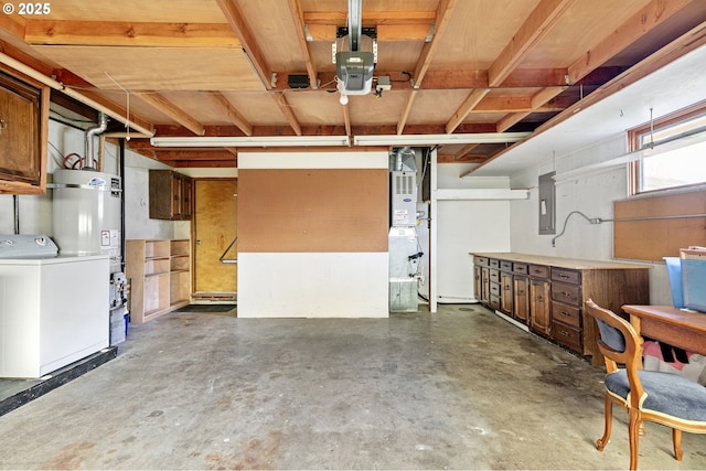 garage with electric panel, secured water heater, washer / clothes dryer, and a garage door opener