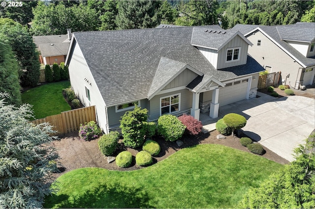 14206 SE Woodside Ave, Milwaukie, OR 97267 - view of front facade featuring concrete driveway, a shingled roof, and board and batten siding