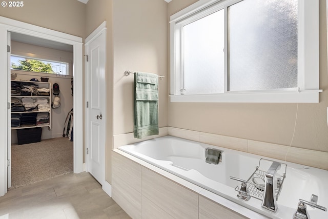 14206 SE Woodside Ave, Milwaukie, OR 97267 - bathroom featuring a garden tub and tile patterned floors