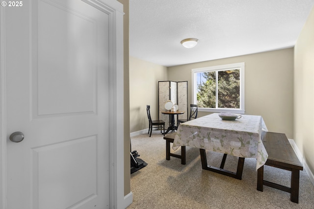 14206 SE Woodside Ave, Milwaukie, OR 97267 - dining area with baseboards, light carpet, and a textured ceiling