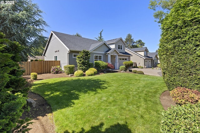 14206 SE Woodside Ave, Milwaukie, OR 97267 - craftsman house featuring board and batten siding, concrete driveway, a garage, and a shingled roof