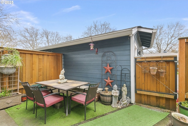 view of patio with outdoor dining area