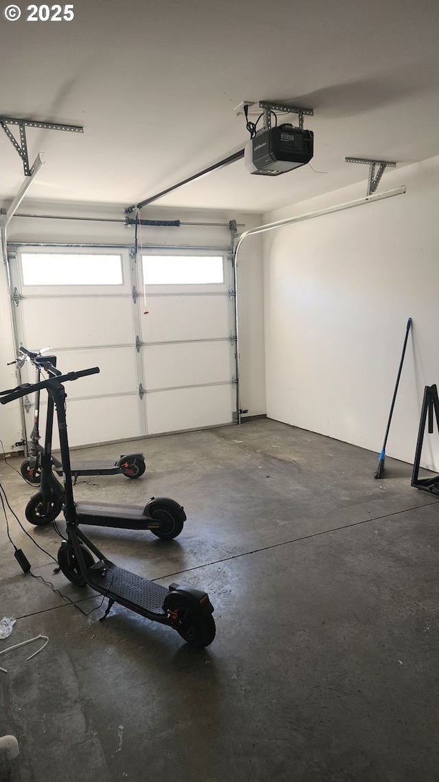 garage featuring a garage door opener