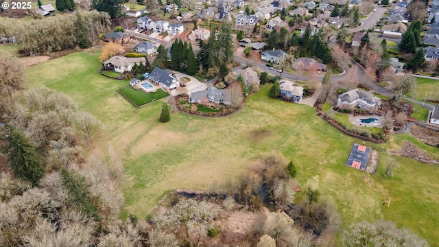 birds eye view of property with a residential view