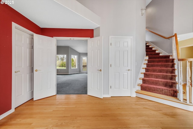 interior space featuring wood finished floors and baseboards