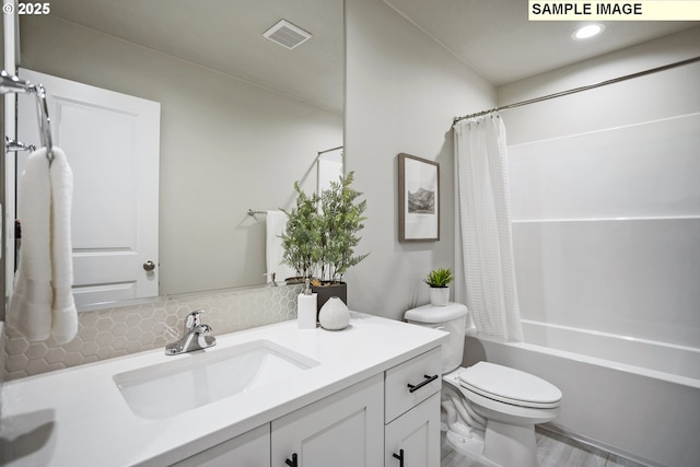 17407 SW Atfalati Ln Unit 45, Sherwood, OR 97140 - full bathroom with toilet, vanity, shower / bath combo, and backsplash