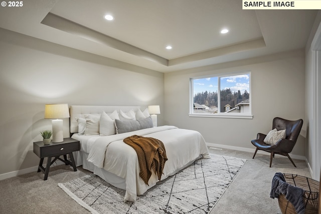17407 SW Atfalati Ln Unit 45, Sherwood, OR 97140 - carpeted bedroom with a tray ceiling, baseboards, and recessed lighting