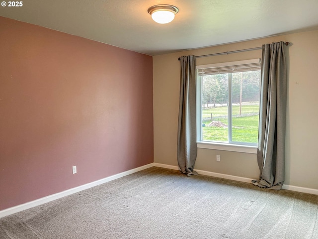 view of carpeted spare room