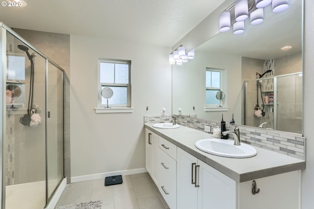 4451 SE Hardwood Ln, Hillsboro, OR 97123 - bathroom with plenty of natural light, tile patterned floors, and a shower stall