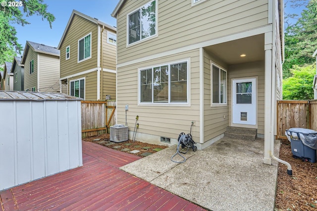 4451 SE Hardwood Ln, Hillsboro, OR 97123 - wooden deck with a fenced backyard, a shed, an outdoor structure, and cooling unit