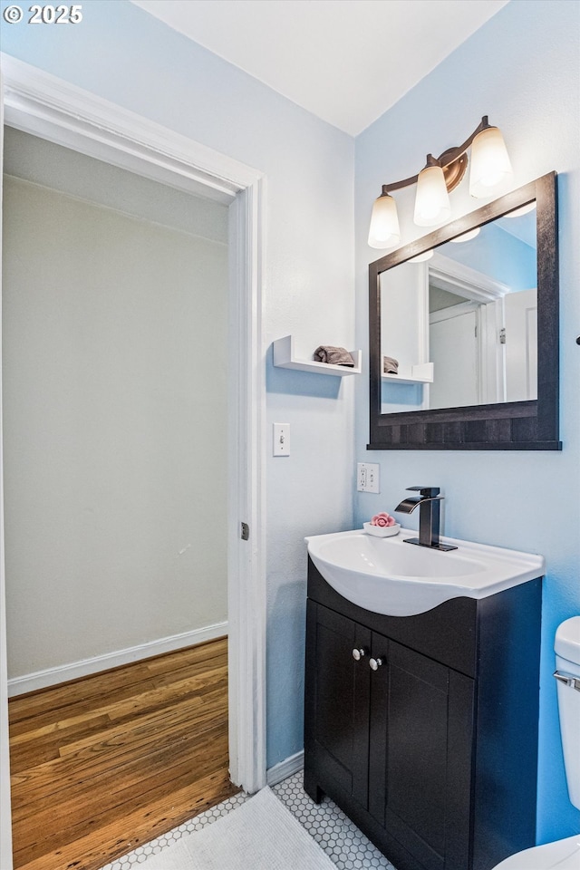 1411 N Alberta St Unit 1, Portland, OR 97035 - bathroom with vanity and wood finished floors