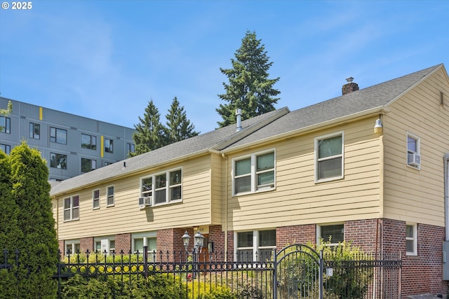 1411 N Alberta St Unit 1, Portland, OR 97035 - back of house with brick siding
