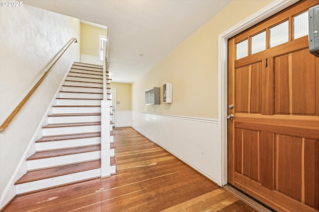 1411 N Alberta St Unit 1, Portland, OR 97035 - foyer featuring wainscoting, stairs, and wood finished floors