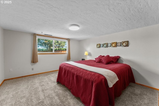 13807 NE Klickitat Ct, Portland, OR 97230 - bedroom with baseboards, carpet floors, and a textured ceiling