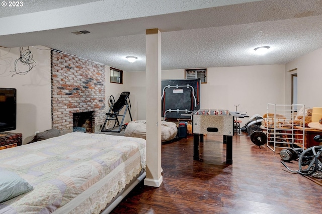 6097 SW Valley Ave, Beaverton, OR 97008 - bedroom featuring wood finished floors and a textured ceiling