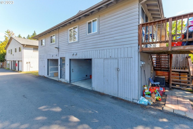 6097 SW Valley Ave, Beaverton, OR 97008 - view of home's exterior featuring stairs and a deck