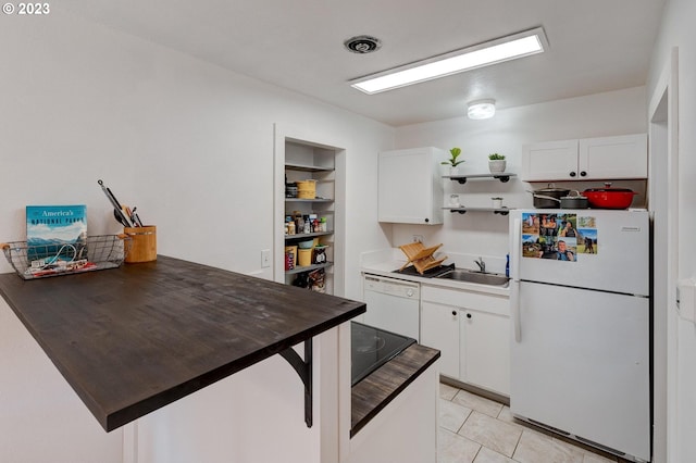 6097 SW Valley Ave, Beaverton, OR 97008 - kitchen with white appliances, open shelves, a sink, dark countertops, and white cabinetry
