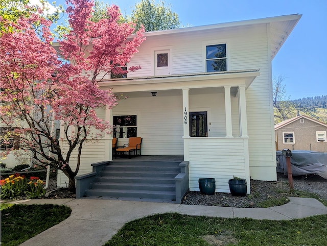 traditional style home featuring a porch