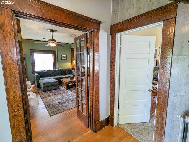 hallway with light wood-style flooring